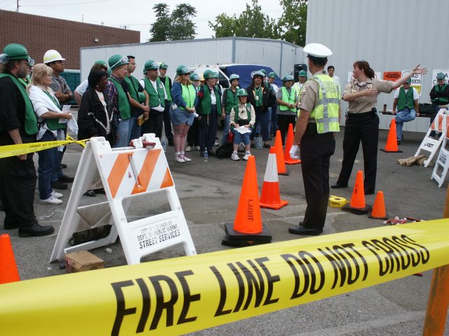 Parking Enforcement taught traffic control hand signs.